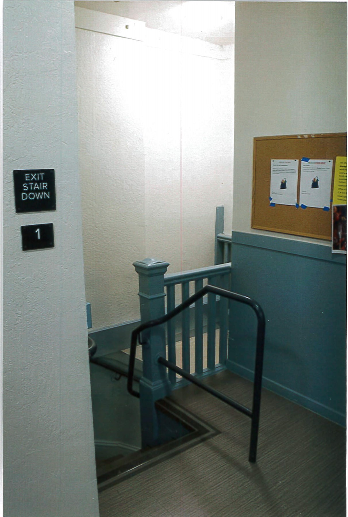 Lobby stairs to lower level, added safety railing